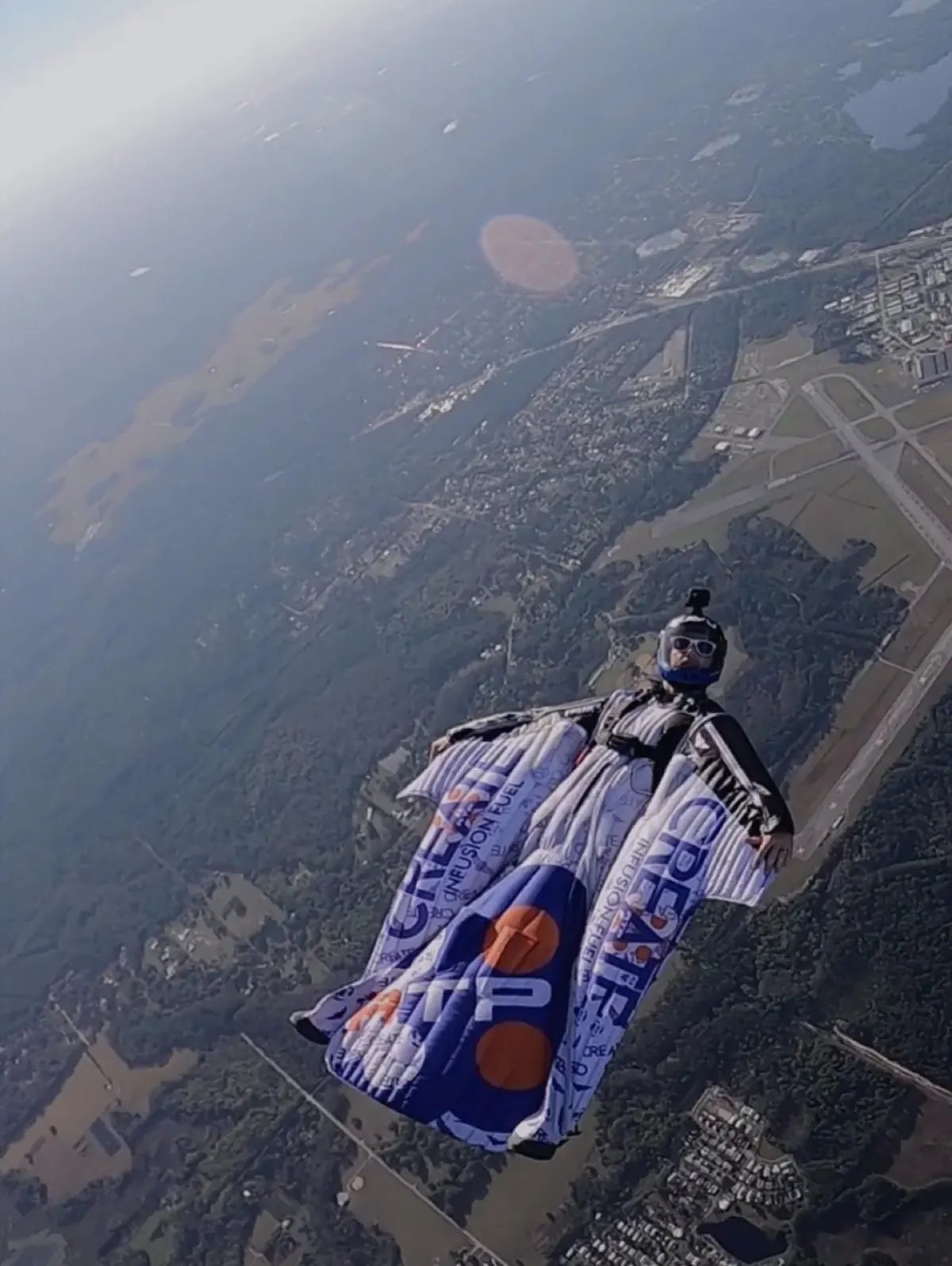 Wingsuit skydive into the sun